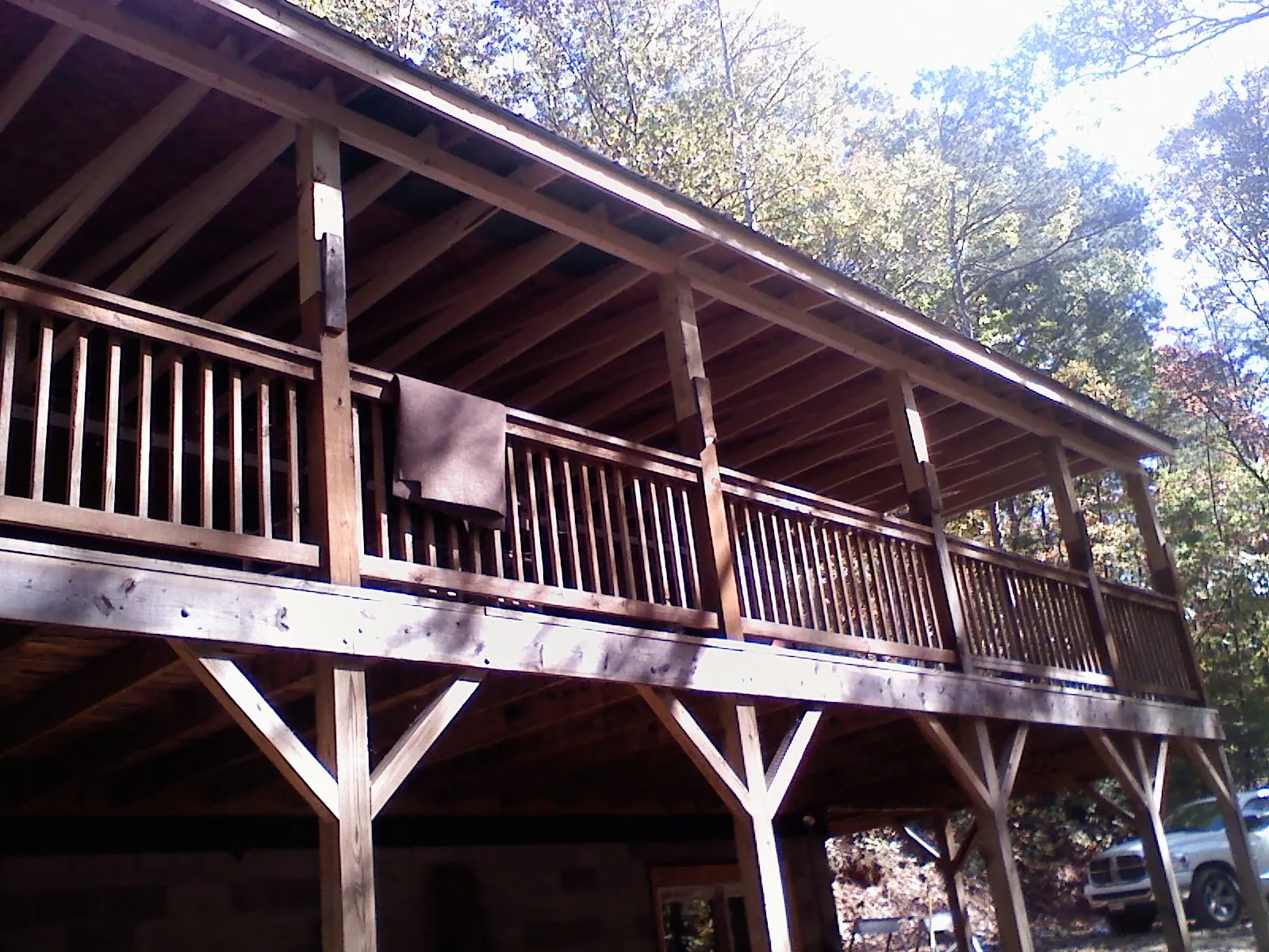 Timber framing under a new elevated porch and deck — Roof Leak Repair in Picabo by Roofing Brothers